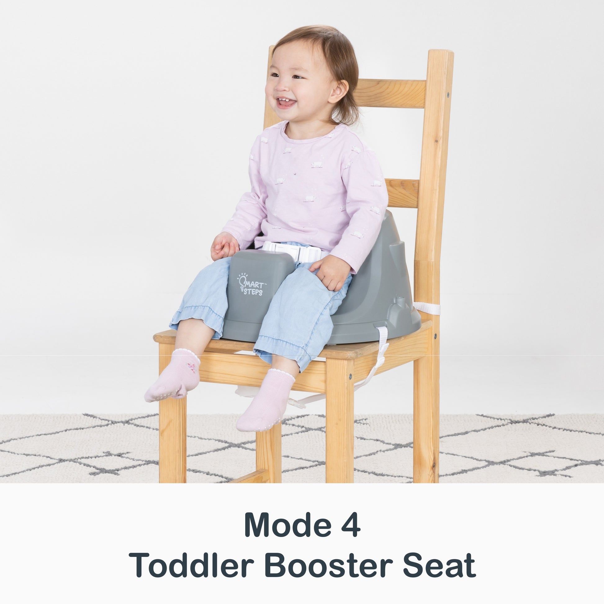 Toddler booster seat mode of the Smart Steps by Baby Trend Explore N’ Play 5-in-1 Activity to Booster Seat