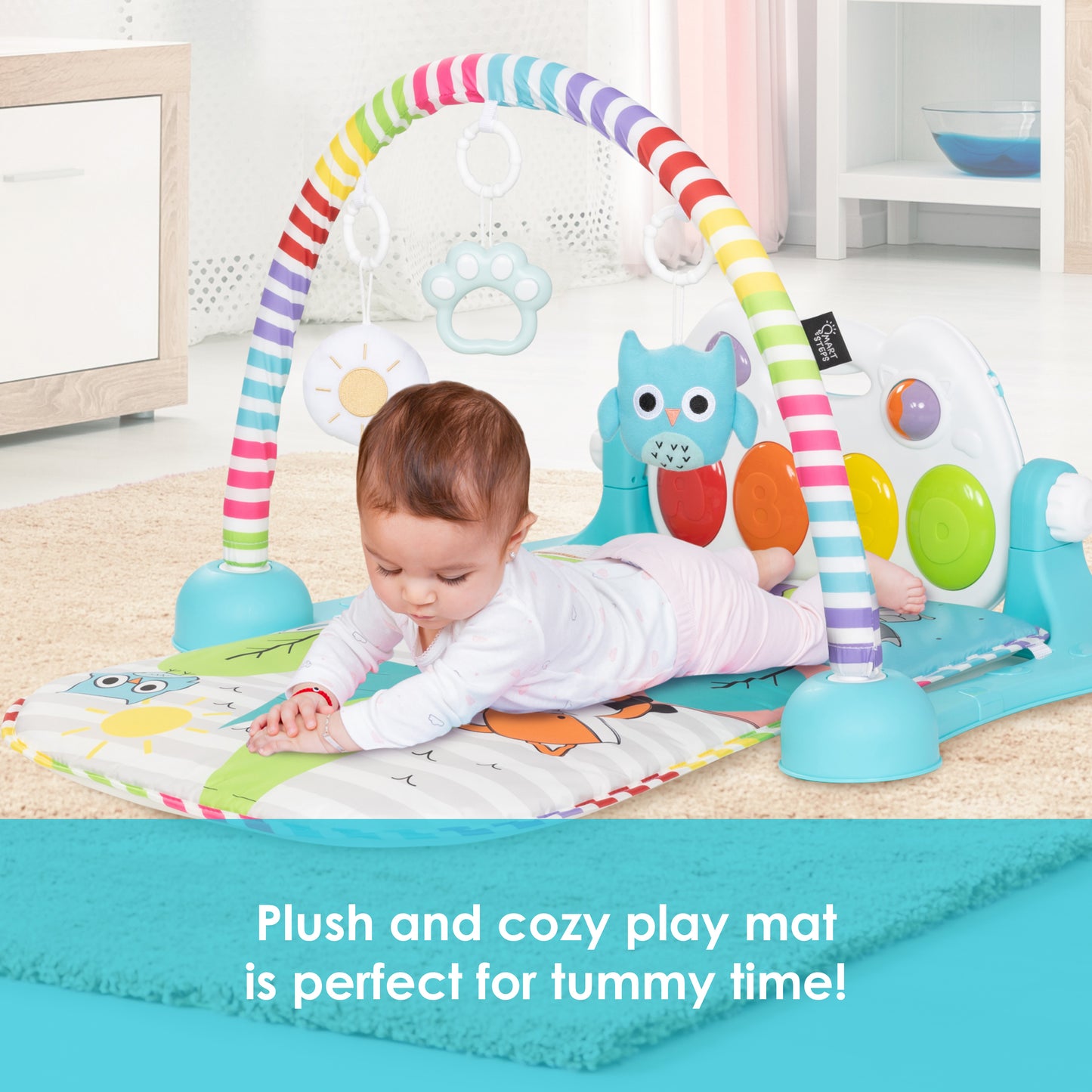 Smart Steps Musical STEM Gym plush and cozy play mat is perfect for tummy time